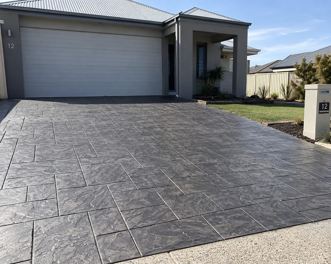 Slate-look stamped concrete driveway laid in a running-bond pattern in Mandurah