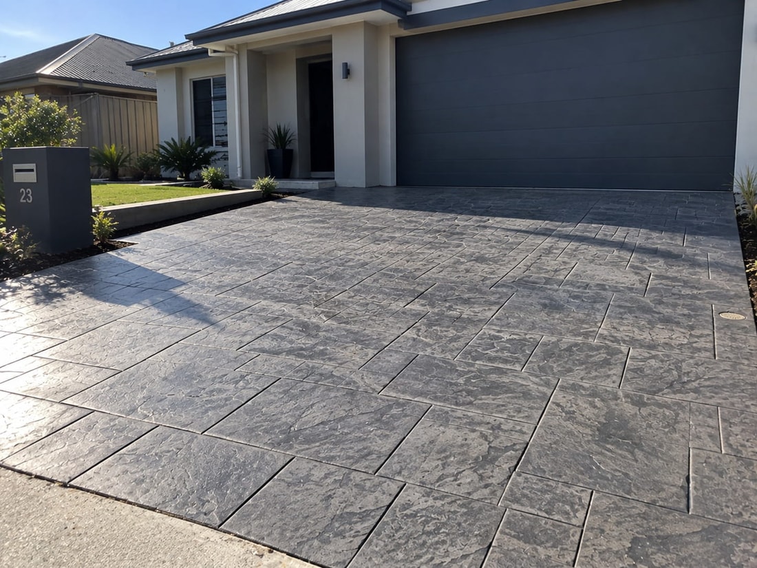 Charcoal slate-pattern stencilled concrete driveway at a Mandurah home